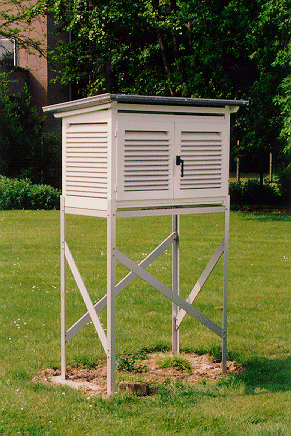 Een thermometerhut met vaste bepalingen van plaats en vorm